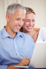 Wall Mural - Mature couple, laptop and smiling with video call, conversation and living room couch. Social media, technology and communication with family, man and woman with connection, streaming and happy