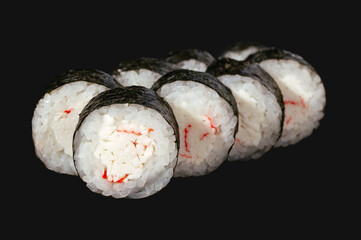 Wall Mural - Maki roll with crab isolated on black background. sushi menu.