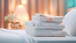 © CreativeBB - Fresh towels on bed in hotel room