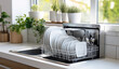 © oksa_studio - Open dishwasher with clean dishes and utensils, in a bright kitchen with plants by the window. High quality photo