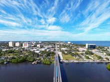Aerial View Of The Newly Built Train Tracks Over Crane Creek Leading To The Indian River And Yacht Harbor In  Historic Downtown Melbourne Along Florida's Space Coast In Brevard County