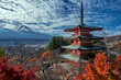 Mount Fuji seen from the Chureito Pagoda and Arakura Sengen Shrine overlooking Fujiyoshida city, Yamanashi Prefecture. Taken in Autumn with Japanese maple trees adding color.