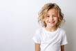 © Olivier - Portrait of a cute kid, girl, smiling, white and neutral teeshirt and background, joy
