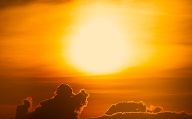 Wall Mural - beautiful golden sunset sky. dramatic yellow and orange sky at sunset time. peaceful and tranquil sc