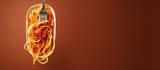 Fototapete - Arrabbiata pasta homemade spaghetti in spicy tomato sauce served with a fork copy space image
