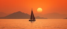 A Sailboat With Raised Sails Is Outlined Against The Sunset And Hazy Orange Sky Amidst Two Coastal Landmasses In Costa Rica Copy Space Image