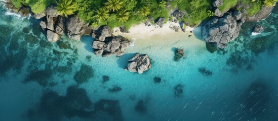 Aufkleber - Aerial drone photo of small island with limestone and emerald sea copy space image