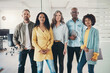 © Flamingo Images - Confident team of diverse businesspeople standing together in an office