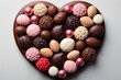 Heart Assorted chocolate candies on white background 