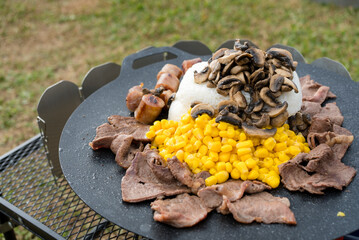 Sticker - Slice of the beef with corn and white rice grill on the metal pan