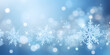 © Oksana - Winter blue background with snowflakes
