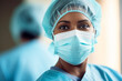 © colnihko - Professional African american doctor surgeon or anesthesiologist wearing scrubs and mask