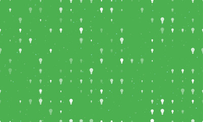 Poster - Seamless background pattern of evenly spaced white lamp symbols of different sizes and opacity. Vector illustration on green background with stars