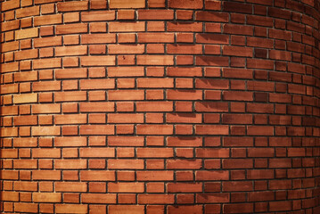 Wall Mural - Red brickwork on a rounded wall, background.