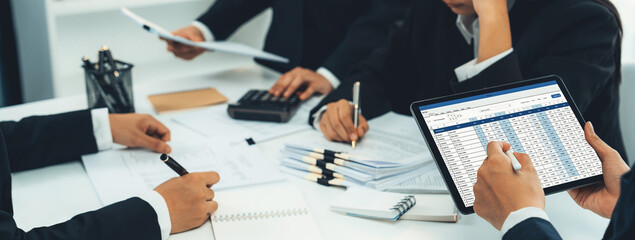 Aufkleber - corporate accountant team use accounting software on tablet to calculate and maximize tax refunds an