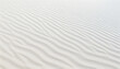 texture of grooves produced by the wind that give the sand an appearance like small waves. The sand is white