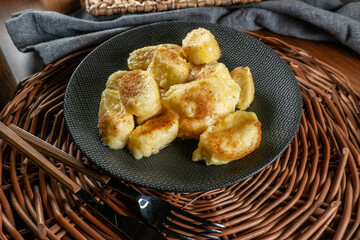 Poster - Homemade lazy noodles with cheese, crumbs and melted butter.