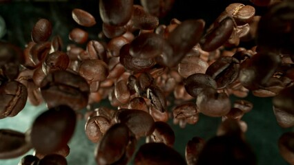 Aufkleber - Super Slow Motion of Falling Coffee Beans Isolated on Black Background. Macro Shot. Filmed on High Speed Cinema Camera, 1000 fps.