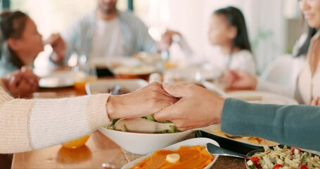 Canvas Print - Religion, holding hands and praying family for food, meal and social gathering in house for celebration, event or holiday. Closeup, people and group in prayer for lunch and thanks in home dining room