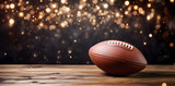 Fototapeta  - American football ball on an empty wooden table with a background of bokeh Christmas lights