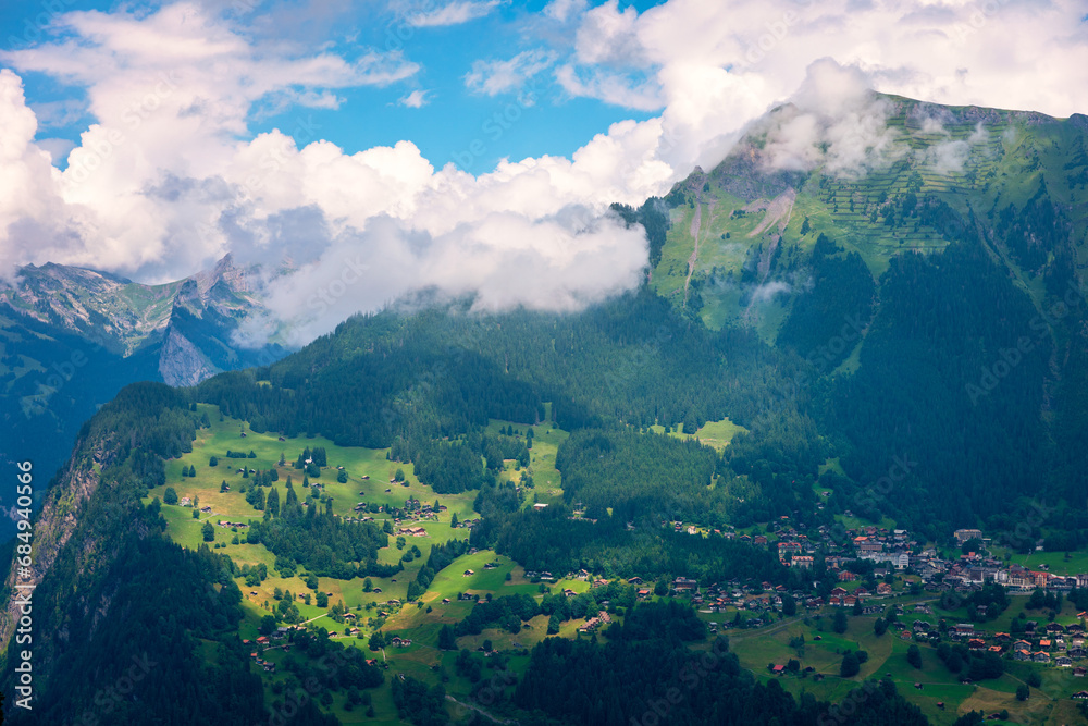 Townscape of village of Wengen on the edge of Lauterbrunnen Valley. Traditional local houses in Wengen village in the Interlaken district in the Bern canton of Switzerland.
