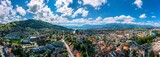 Fototapeta  - Panorama of Thun city with Alps and Thunersee lake, Switzerland. Historical Thun city and lake Thun with Bernese Highlands swiss Alps mountains in background, Canton Bern, Switzerland.