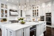 Kitchen in luxury home with white cabinetry