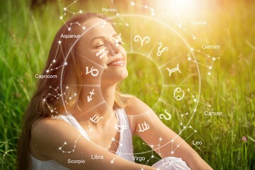 Wall Mural - beautiful young happy woman and zodiac wheel