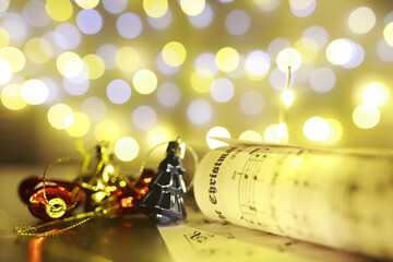 Canvas Print - Christmas decorations on music sheets, closeup