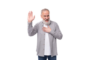 Wall Mural - handsome funny gray-haired elderly man with a beard and mustache in a plaid shirt on a white background with copy space