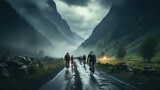 Cyclists on the road in the mountains in the fog.