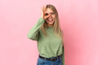 © luismolinero - Young blonde woman isolated on pink background showing ok sign with fingers