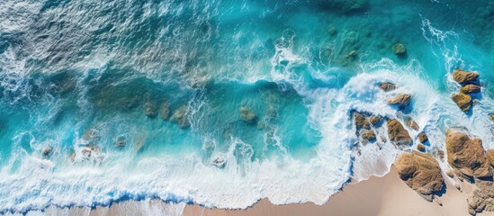 Sticker - From high above, the drone captured the breathtaking beauty of Greece's blue ocean, as the shimmering sea met the golden sand of a stunning beach, creating a picturesque landscape for summer travelers