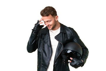 Wall Mural - Young caucasian man with a motorcycle helmet over isolated chroma key background laughing