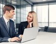 © BillionPhotos.com - manager teaching young worker discussing strategy