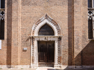 Wall Mural - Ornate doorway and facade of the church of San Gregorio, Venice, Italy