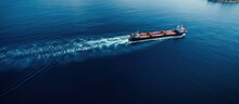 Drone Captures Tug Boat Towing Empty Barge At Sea Copy Space Image