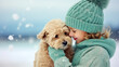 Kind und Hundewelpe im Winter