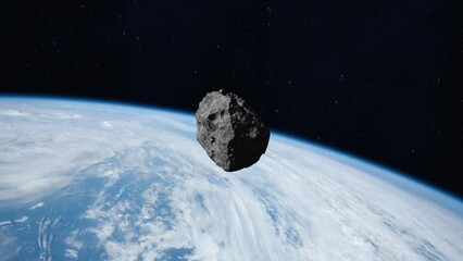 Wall Mural - the asteroid falls to earth. asteroid on a collision course with planet earth. 4k video. elements of