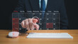 © Thawatchai Images - Businessman marking dates on virtual calendar, managing his business schedule, setting reminders for important appointments, creative collage for planning ideas, appointment scheduler