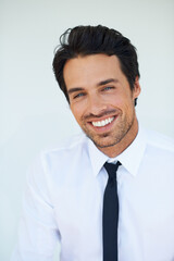 Wall Mural - Portrait, smile and a young business man in a shirt on a white background for professional employment. Face, company and mindset with a happy or confident employee in a tie to work on his career