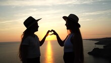 Hands Heart Sea Sanset. Hands Forming A Heart Shape Made Against The Sun Sky Of A Sunrise Or Sunset On A Beach