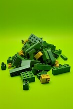 Vibrant Green Lego Bricks Piled High On A Matching Background For Creative Play And Building Fun Generative AI