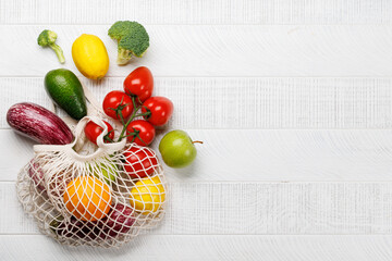 Wall Mural - Mesh bag filled with a variety of vegetables