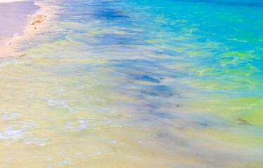  Waves at tropical beach caribbean sea clear turquoise water Mexico.