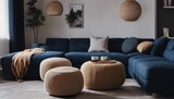 Fototapeta  - Two knitted poufs near dark blue corner sofa. Scandinavian home interior design of modern living room