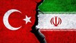 Iran and Turkey flags together on wall with cracked. Turkey Iran conflict