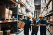 © Davor - Diverse group of warehouse workers using a smartphone while carrying boxes and working in a warehouse