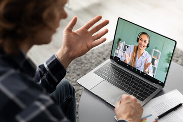Poster - Guy Making Video Call With Lady Consultant On Laptop Indoor