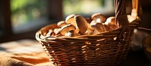 Selective Focus On Wicker Basket And Table With Jew's Ear Mushroom.